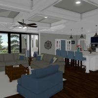 Open kitchen design leading to the living area. White cabinets contrast against the dark hardwoods.