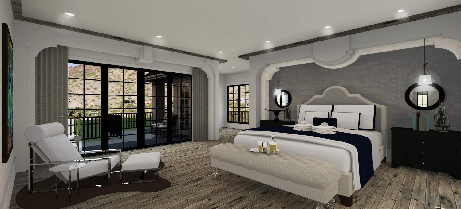 Grand primary bedroom with seating area and a private patio.