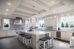 Kitchen space with large island and full backsplash